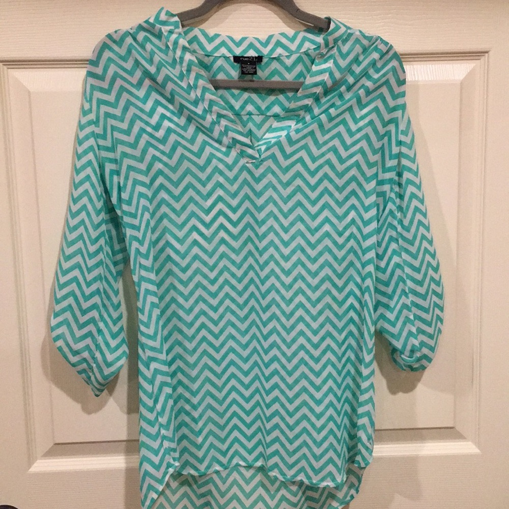 Teal and white chevron patterned top